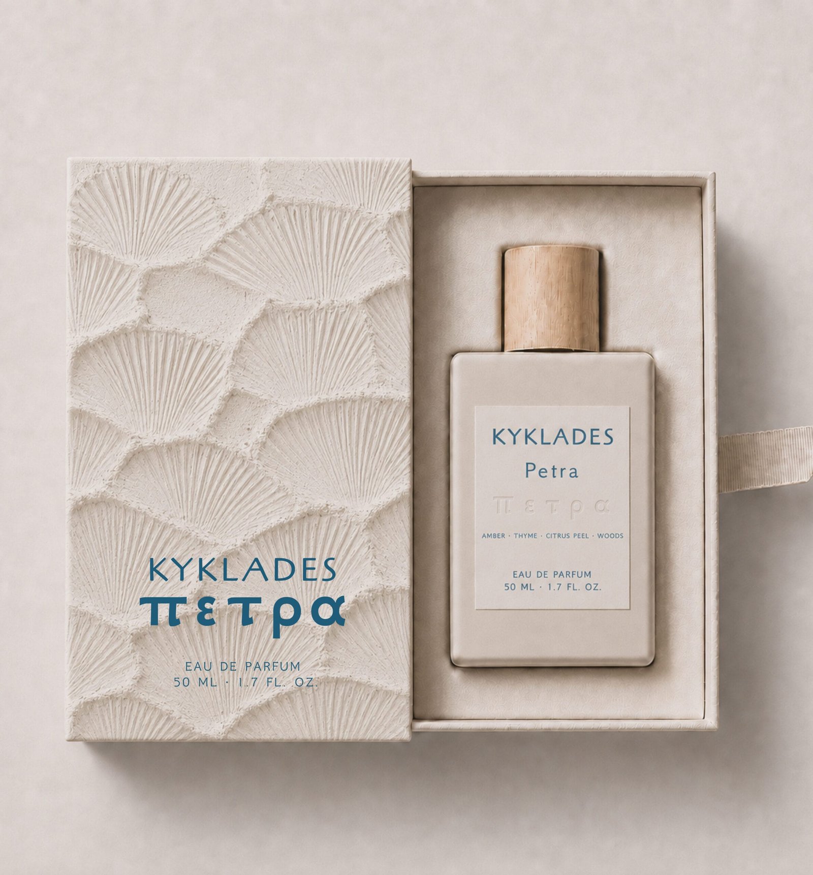 KYKLADES Petra perfume packaging with stone and shell relief